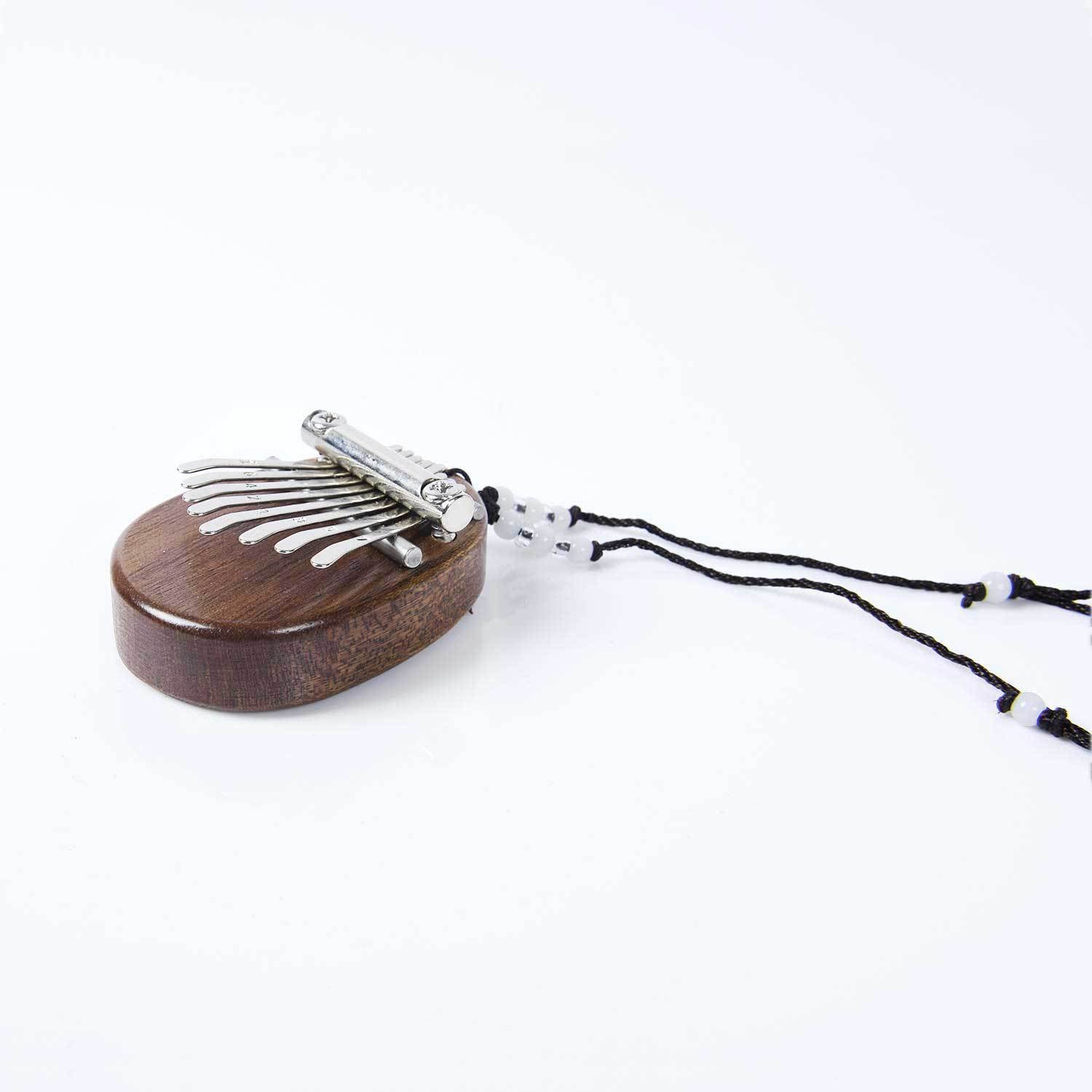 Solid wood thumb piano