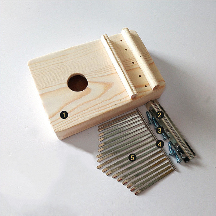 Seventeen-key solid wood thumb piano