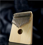 Seventeen-key solid wood thumb piano