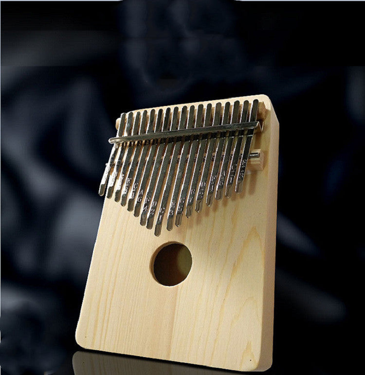 Seventeen-key solid wood thumb piano