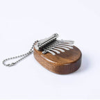 Solid wood thumb piano